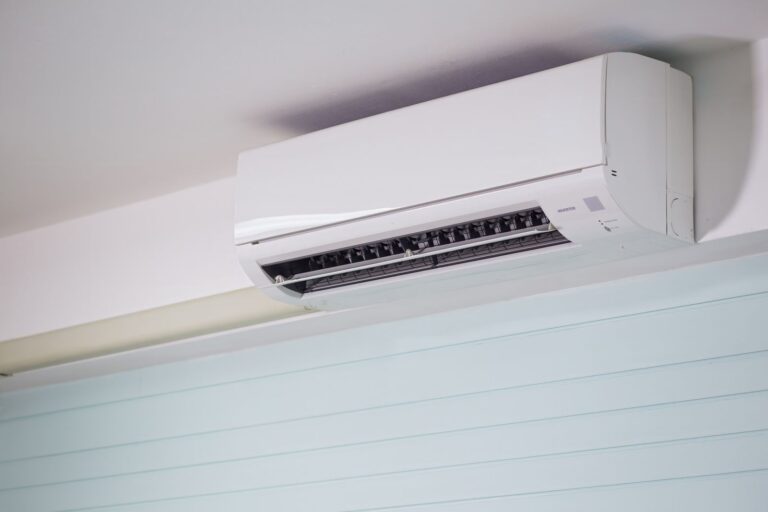 Wall-mounted ductless mini split heat pump indoor unit in a home