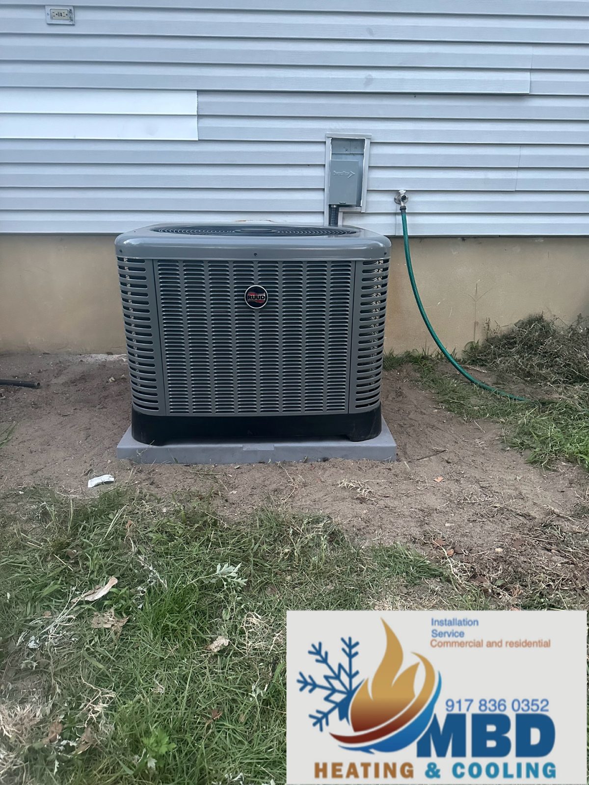 New outdoor condenser on a lawn