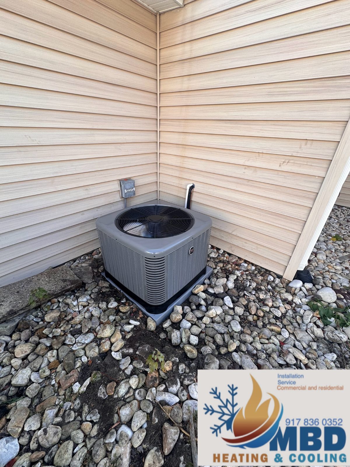 Outdoor condenser at the corner of a house
