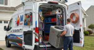 MBD technician unloading equipment from a service van outside a customer's home